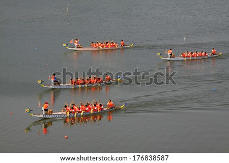 LUANNAN - JUNE 14: The dragon boat race scene in Chinese traditional Dragon Boat Festival on June 14, 2013, Luannan, Hebei Province, China.