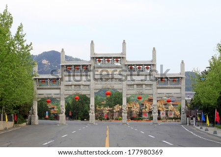 LONGKOU - MAY 16: Nanshan Giant Buddha scenic area gate in Nanshan Scenic Area on May 16, 2013, Longkou, Shandong Province, China