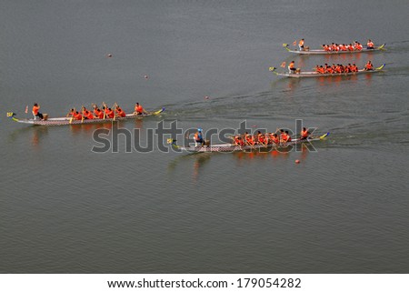 LUANNAN, CHINA - JUNE 14: Dragon boat race scene in Chinese traditional Dragon Boat Festival on June 14, 2013, Luannan, Hebei Province, China.