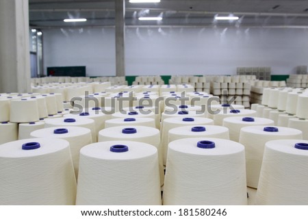 LUANNAN - MARCH 13: Cotton-waste piled up in the production workshop in a spinning production company, March 13, 2013, Luannan County, Hebei Province, china.