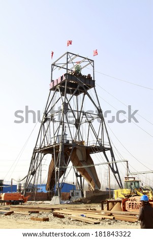 MACHENG - March 13: Drilling derrick in MaCheng iron mine on march 13, 2014, Luannan County, Hebei Province, China