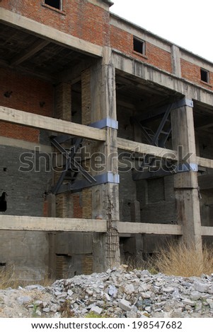 concrete pouring abandoned building, closeup of photo