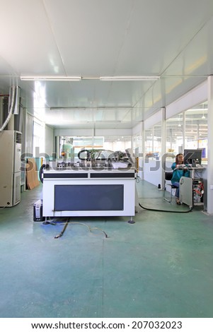 TANGSHAN CITY - MAY 28: Large ink jet printers in a production workshop, on may 28, 2014, Tangshan city, Hebei Province, China