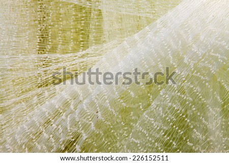 White nylon fishing nets, closeup of photo