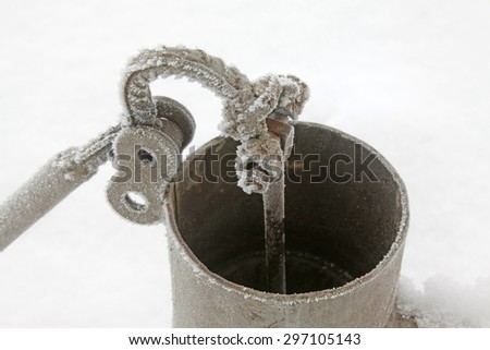 rural artificial Wells in the frost and snow, closeup of photo