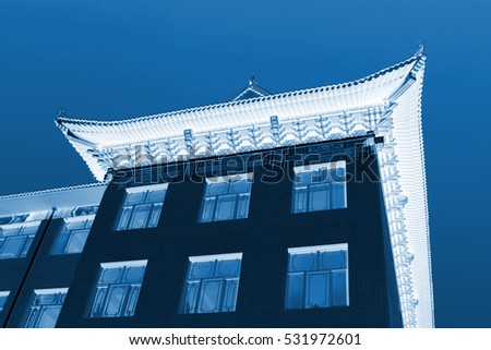 Chinese traditional building under the blue sky, closeup of photo