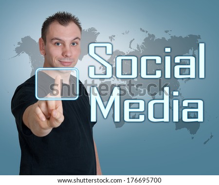 Young man press digital Social Media button on interface in front of him