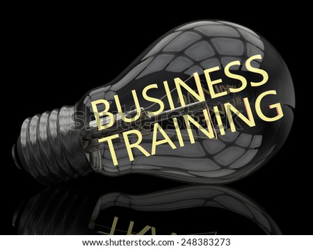 Business Training - lightbulb on black background with text in it. 3d render illustration.