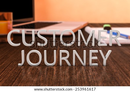 Customer Journey - letters on wooden desk with laptop computer and a notebook. 3d render illustration.