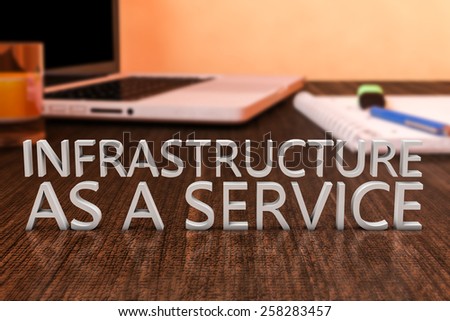 Infrastructure as a Service - letters on wooden desk with laptop computer and a notebook. 3d render illustration.