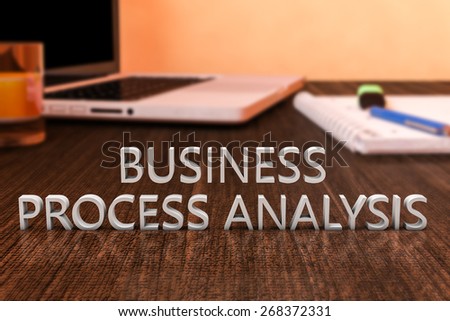 Business Process Analysis - letters on wooden desk with laptop computer and a notebook. 3d render illustration.