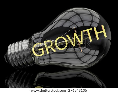 Growth - lightbulb on black background with text in it. 3d render illustration.