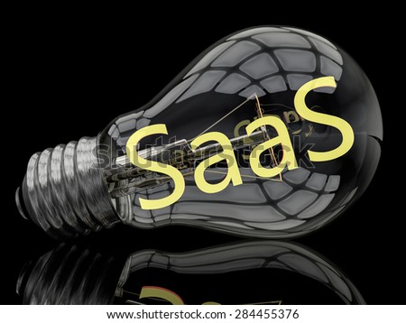 SaaS - Software as a Service - lightbulb on black background with text in it. 3d render illustration.