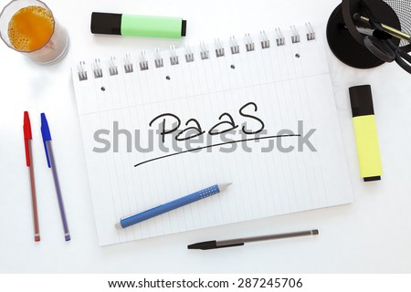 PaaS - Platform as a Service - handwritten text in a notebook on a desk - 3d render illustration.