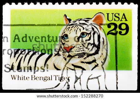 UNITED STATES - CIRCA 1992: a postage stamp printed in United States showing an image of a white bengal tiger, circa 1992.