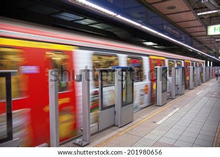 TAIPEI, TAIWAN - JULY 1: Fast MRTsubway wagon leaving platform on June 1, 2014 in Taipei. The Taipei MRT Subway is one of the best way to go ground Taipei city and new line is still under construction