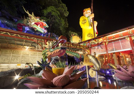TAIPE, TAIWAN-JULY 14:  Hunglodei Temple at night. It\'s one of the oldest temple in Taiwan on July 14, 2014. It has the largest status of Tudi Gong, the God of the earth  in Taiwan (109 meters tall).