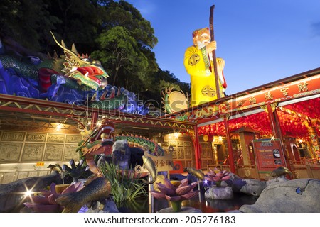 TAIPE, TAIWAN-JULY 14: Hunglodei Temple at night. It\'s one of the oldest temple in Taiwan on July 14, 2014. It has the largest status of Tudi Gong, the God of the earth in Taiwan (109 meters tall)