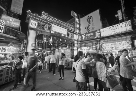 TAIPEI - TAIWAN, NOVEMBER 22, 2014: Entrance of Raohe Street Night Market in Taipei. on November 22. Raohe Night Market is one of the biggest, oldest, and popular among local and tourists in Taipei