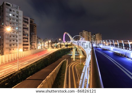 a  look at the expressway from the bridge for the bike in the modern city at night