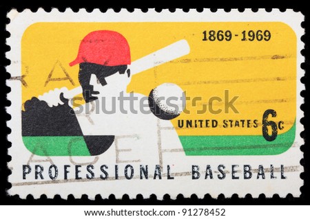 USA -CIRCA 1969: A stamp printed in USA shows a professional baseball player.  The first salaried team was the Cincinnati Red Stockings in 1869, circa 1969
