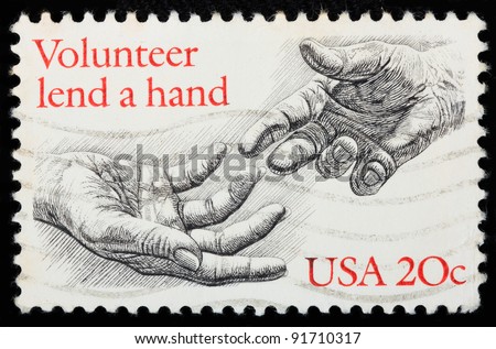 USA  -CIRCA 1983:  A stamp printed in USA shows helping hand to pay tribute to the millions of American who give of their money, time in order to help others in need, circa 1983