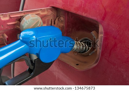 Refueling the car with fuel on a filling station
