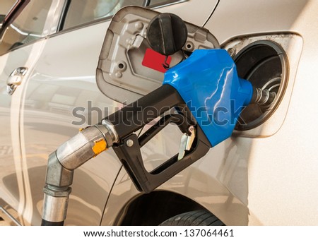 Refueling the car with fuel on a filling station