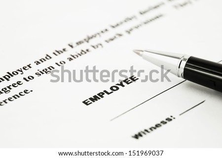 Employment contract and pen ready to sign it