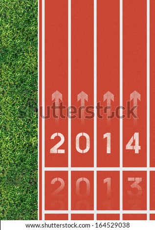 New Year 2014 is going forward - inscription 2013 and 2014 on running track, Old year 2013 be left behind.