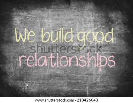 We build good relationships,writing on chalkboard