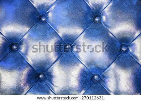 Blue leather upholstery sofa background for decoration.