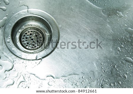 water drain in the metal sink