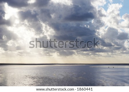 God ray at sunset over the sea