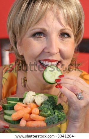 woman eating healthy food upclose vertical