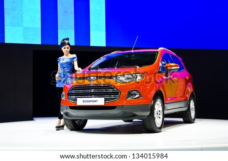 BANGKOK - MARCH 26 : The Ford Ecosport car with unidentified model on display at The 34th Bangkok International Motor Show 2013 on March 26, 2013 in Bangkok, Thailand.