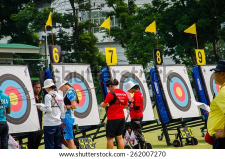 BANGKOK -MARCH 19: Unidentified archers check point in 2015 Asia Cup-World Ranking Tournament (stage II) at Hua Mak Sports Complex on March 19, 2015 in Bangkok, Thailand.