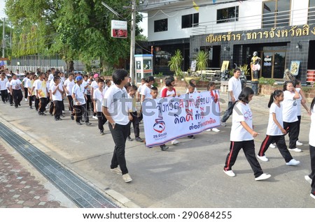 SINGBURI - JUNE 26 : Volunteers walking to campaign The International Day against Drug in order to promote aware of the dangers of drugs, June 26, 2015, Singburi, Thailand.