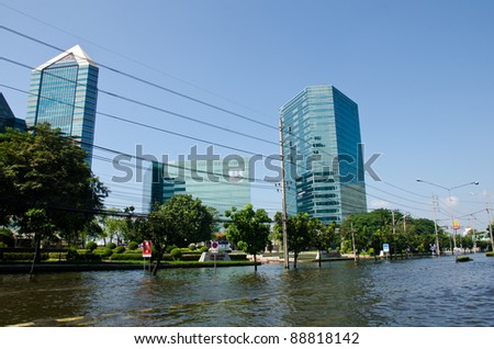 BANGKOK THAILAND – NOVEMBER 13: Bangkok areas full of flood water higher levels than expected,The Siam Commercial Bank, Limited  affected by flood on November 13, 2011  in Bangkok, Thailand.
