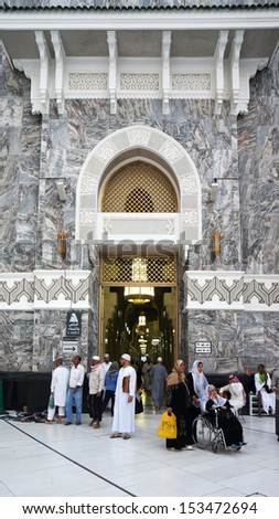 MECCA - MAY 26 : Early morning view of pilgrims at the ladies entrance of Kaaba that on renovation on May 26, 2013 in Mecca, Saudi Arabia. Kaaba is the holiest and most visited mosque for all Muslims.