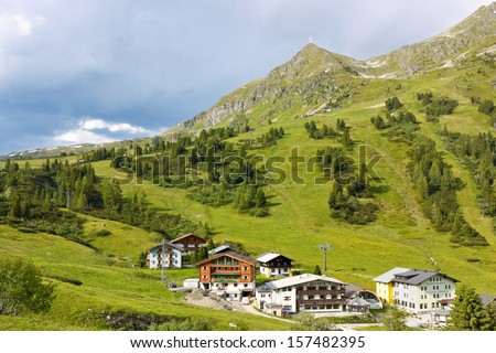 OBERTAUERN, AUSTRIA - JULY 2: Hotels and guesthouses at the resort in austrian Alps on July 2, 2013. Austria is famous for recreational mountain resorts.