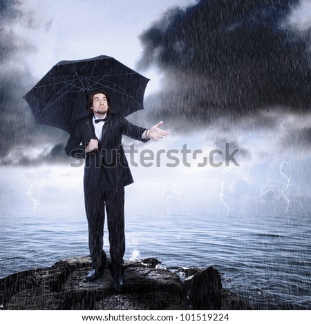 Stylish Man with Umbrella Checking for Rain (storm clearing or coming)