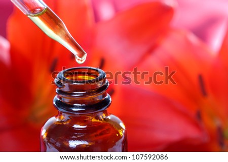 Herbal Medicine Tincture with Flowers (red lilies)