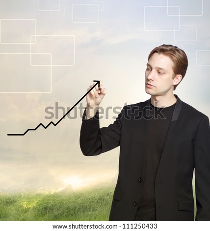Man Drawing Graph Representing Growth