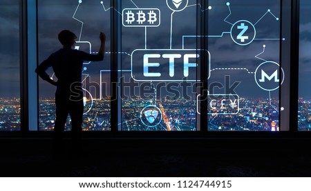 Cryptocurrency ETF theme with man writing on large windows high above a sprawling city at night