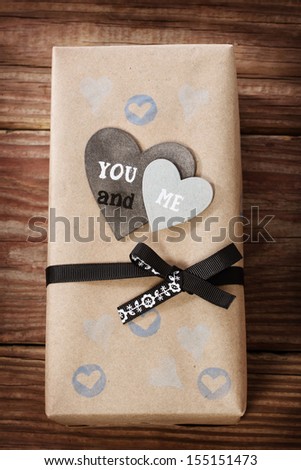 Hand crafted love appreciation present box on rustic wooden table