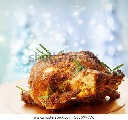 Roasted Whole Chicken with Rosemary on a Winter Blue Backdrops