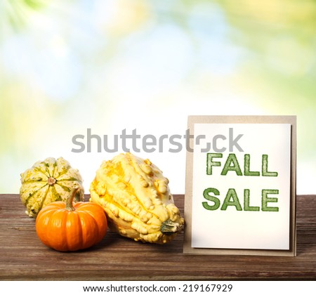 Fall Sale sign with pumpkins and squashes