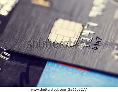 A microchip and raised numbers on a bank card