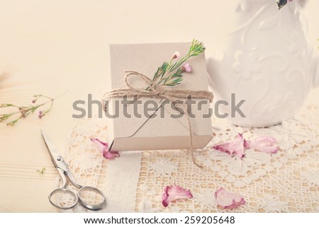 Hand crafted present box with flower petals